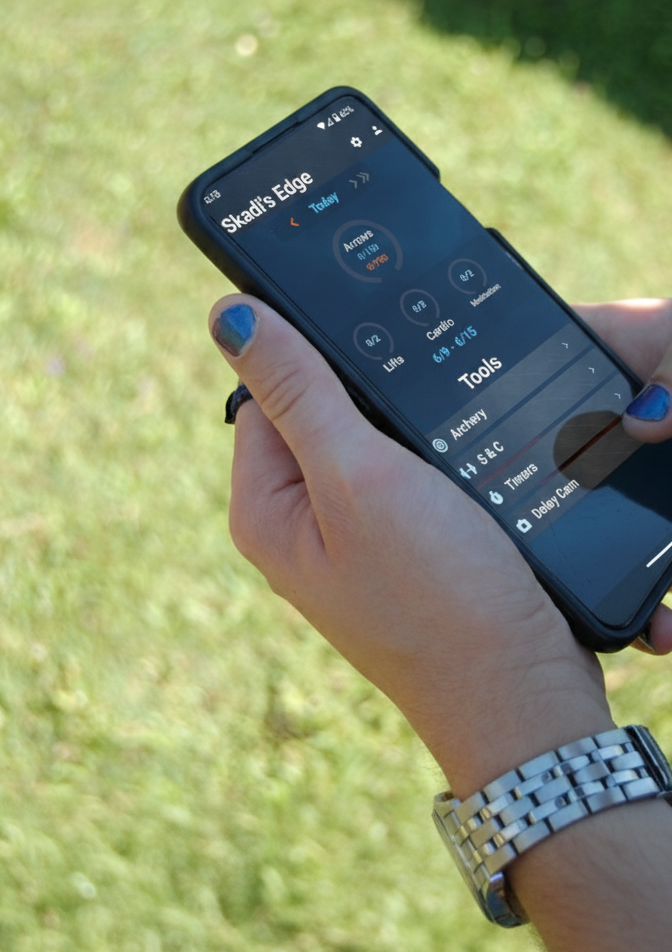 An archer holding the Skadi's Edge app on the field